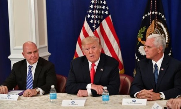 © AFP/File | US National Security Advisor H.R. McMaster, President Donald Trump and Vice President Mike Pence (L to R) were among those attending Friday's talks at Camp David