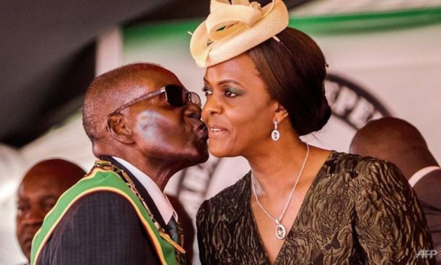 Grace Mugabe, the wife of Zimbabwe's longtime leader, is seeking diplomatic immunity over an alleged assault in South Africa - AFP