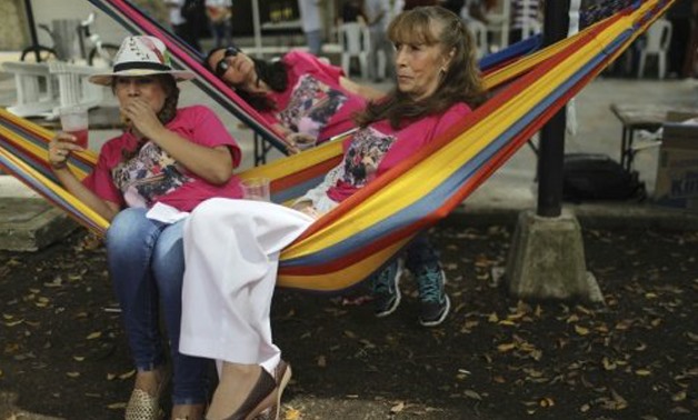 Colombians celebrate the World Day of Laziness in Itagui, near Medellin. The day was created to call attention to the need to unwind from the stresses of working life