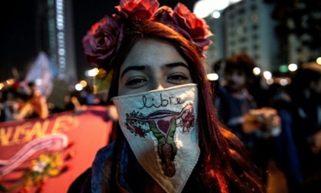  A measure to ease Chile's strict ban on abortion, upheld by the country's constitutional court, has drawn protests for and against, like this one in July by activists who decriminalizing the procedure