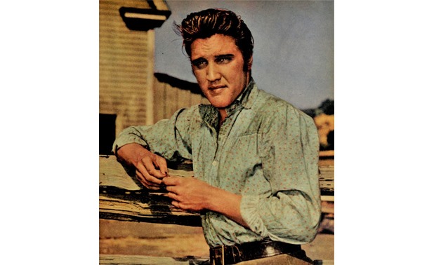 Elvis Presley on the set of ‘Love Me Tender’ via Wikimedia
