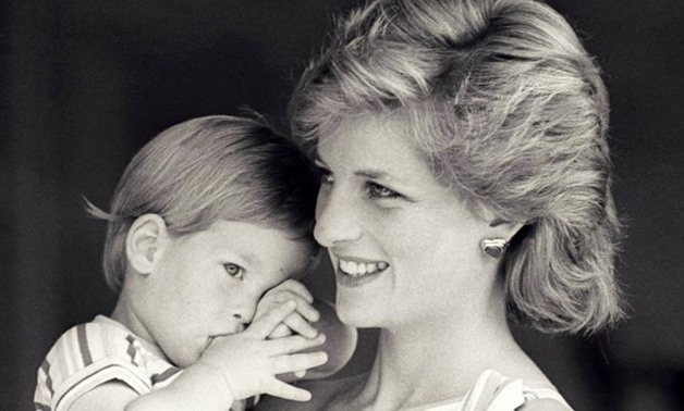 Princess Diana holds Prince Harry, August 1988