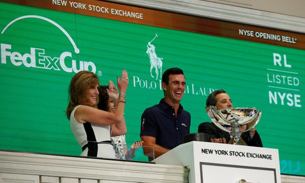 2014 FedEx Cup Champion Horschel rings the opening bell at the NYSE in New York - REUTERS