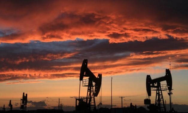 FILE PHOTO - Site of an oil field is seen at sunset in Karamay, Xinjiang Uighur Autonomous Region, China, May 7, 2017. Picture taken May 7, 2017.
Stringer