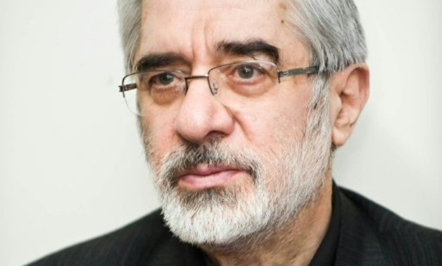 © AFP/File | Iranian opposition leader Mir Hossein Mousavi was put under house arrest in 2011

