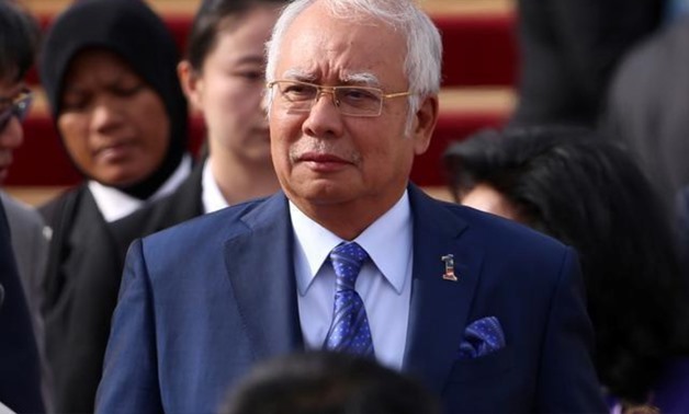 Malaysian Prime Minister Najib Razak arrives at the Beijing Capital International Aiport to attend the Belt and Road Forum, in Beijing, China May 12, 2017. 
FILE PHOTO