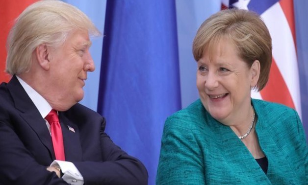 U.S. President Donald Trump and German Chancellor Angela Merkel attend the Women’s Entrepreneurship Finance event during the G20 leaders summit in Hamburg, Germany July 8, 2017.
Michael Kappeler, Pool