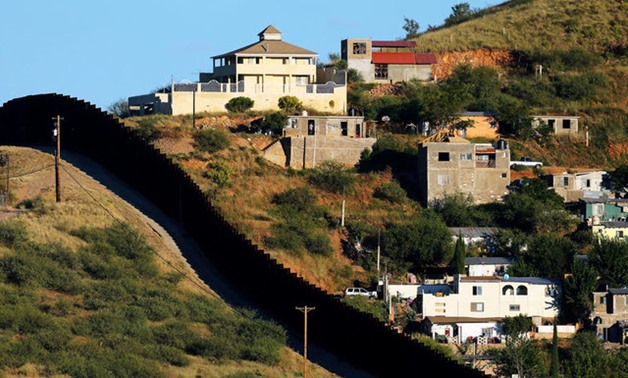 File photo of buildings in Nogales, Mexico separated by a border fence from Nogales, Arizona - REUTERS