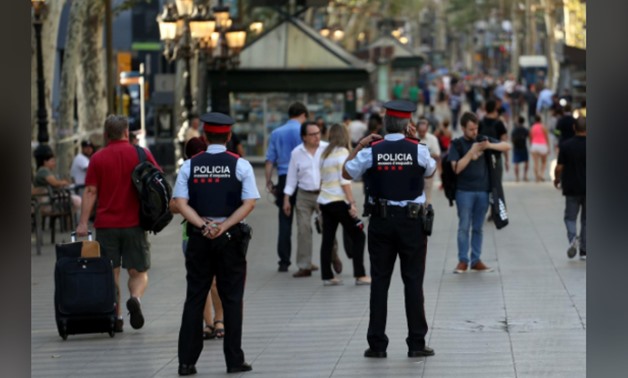 Catalan Mossos d'esquards officers patrol at Las Ramblas street where a van crashed into pedestrians in Barcelona, Spain August 18,2017  
REUTERS-Sergio Perez   