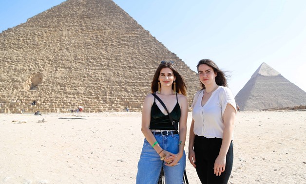 Shyma and Ata at the pyramids on their second day of the tour