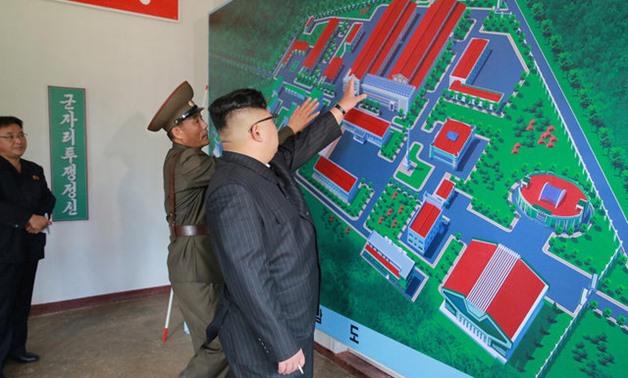 North Korean leader Kim Jong-Un gives field guidance during a visit to the Chemical Material Institute of the Academy of Defense Science in this undated photo released by North Korea's Korean Central News Agency (KCNA) in Pyongyang - REUTERS
