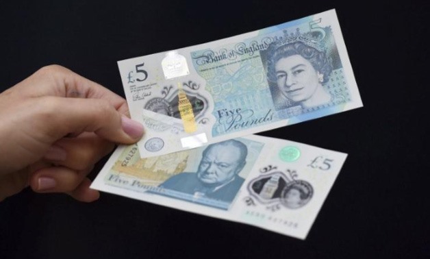 The new polymer 5 pound Sterling note featuring Sir Winston Churchill, is unveiled at Blenheim Palace in Oxfordshire, Britain June 2, 2016.
Joe Giddens/Pool