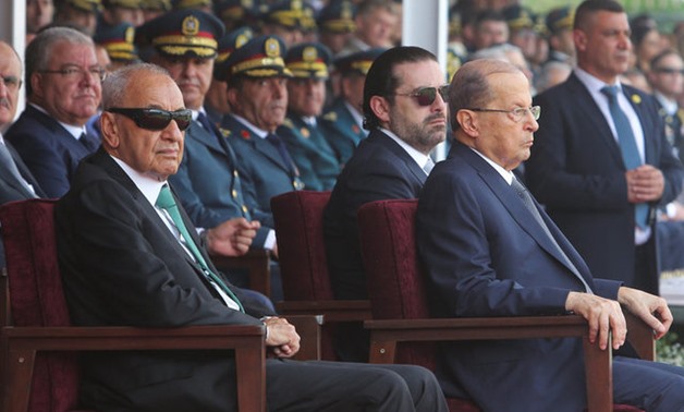 Lebanon's President Michel Aoun, Lebanon's Prime Minister Saad al-Hariri and Parliament Speaker Nabih Berri attend a graduation parade for Lebanese officer cadets at a military academy marking the 72nd army day in Fayadyeh - REUTERS
