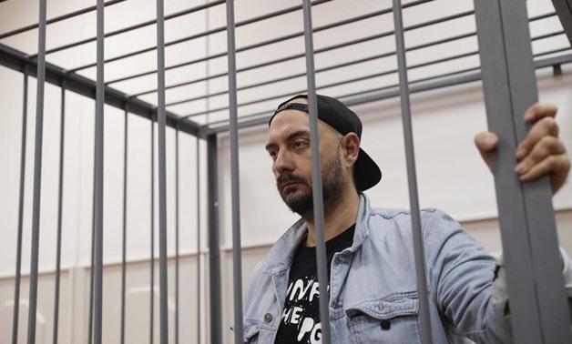 Russian theatre director Kirill Serebrennikov, who was detained and accused of embezzling state funds, stands inside the defendants' cage as he attends a hearing on his detention at a court in Moscow, Russia August 23, 2017.
Tatyana Makeyeva