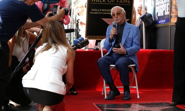 French singer Charles Aznavour gets Hollywood star at age 93 - Press photo