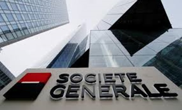 The logo of the French bank Societe Generale is seen in front of the bank's headquarters building at La Defense business and financial district in Courbevoie near Paris, France, April 21, 2016 - Reuters