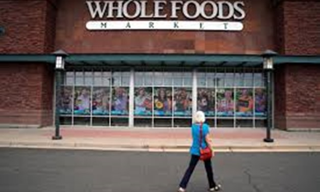A customer enters the Whole Foods Market in Superior, Colorado United States July 26, 2017 - REUTERS