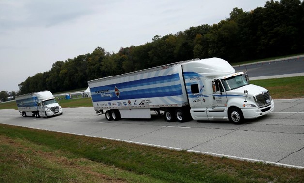 Two trucks demonstrate "platooning" technology at the Navistar Proving Grounds in New Carlisle