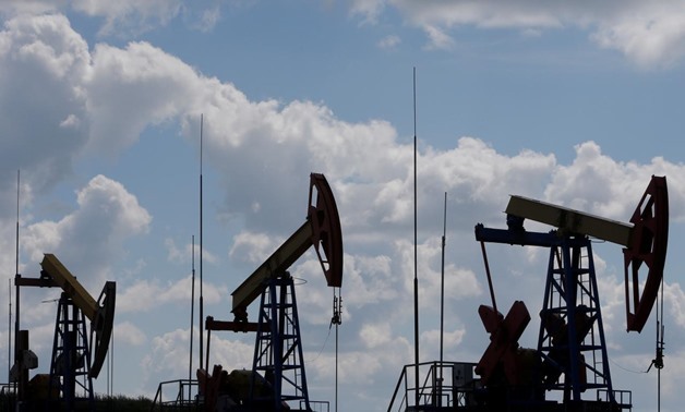 Pump jacks are seen at the Ashalchinskoye oil field owned by Russia's oil producer Tatneft near Almetyevsk, in the Republic of Tatarstan, Russia, July 27, 2017. Sergei Karpukhin