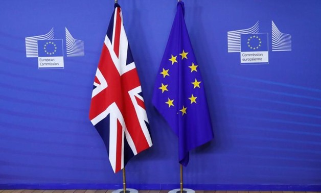 Flags are seen at the EU Commission headquarters ahead of a first full round of talks on Brexit, Britain's divorce terms from the European Union, in Brussels, Belgium July 17, 2017.
Yves Herman