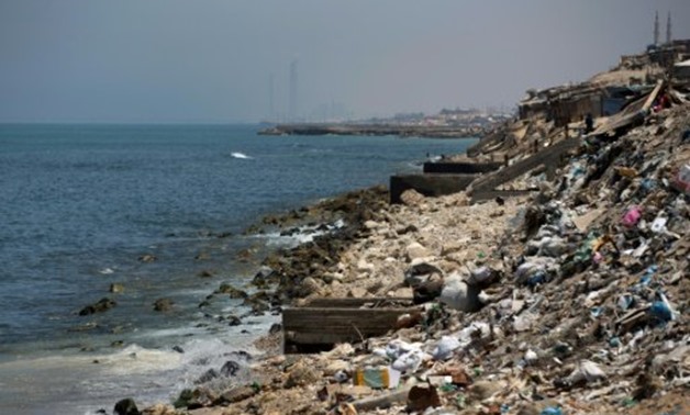 © AFP/File / by Adel Zaanoun | Dozens of people have been treated after swimming along the Gaza Strip's filthy Mediterranean coastline in the past two months
