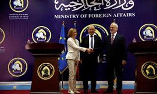 French Defence Minister Florence Parly (L) shakes hands with Iraqi Foreign Minister Ibrahim al-Jaafari with French Foreign Minister Jean-Yves Le Drian present during a joint news conferencein Baghdad, Iraq August 26, 2017.
Khalid al Mousily