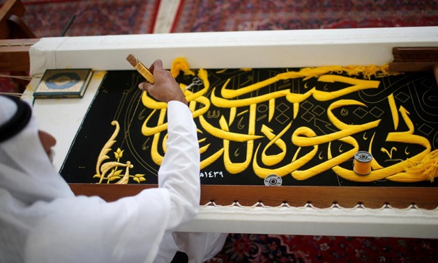 A man embroiders the Kiswa, a silk cloth covering the Holy Kaaba, ahead of the annual haj pilgrimage, at a factory in the holy city of Mecca, Saudi Arabia August 26, 2017.
Suhaib Salem