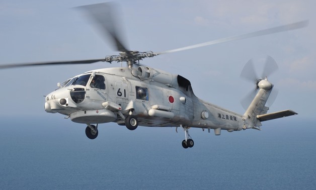 Three missing after Japan military helicopter loses contact over Sea of Japan - Reuters