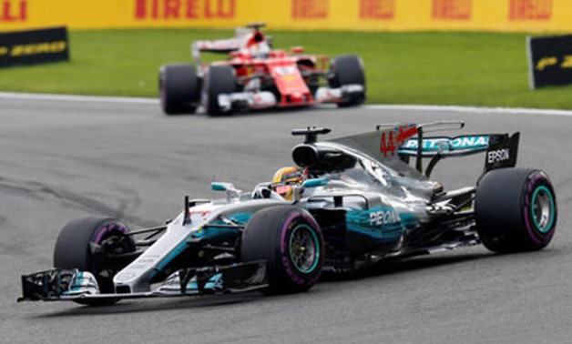 Hamilton marks 200th race with victory in Belgium - Reuters