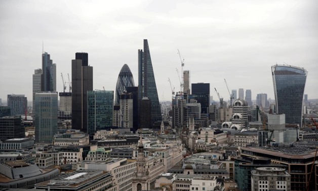 FILE PHOTO: A view of the London skyline shows the City of London financial district, seen from St Paul's Cathedral in London, Britain February 25, 2017.
Neil Hall/File Photo