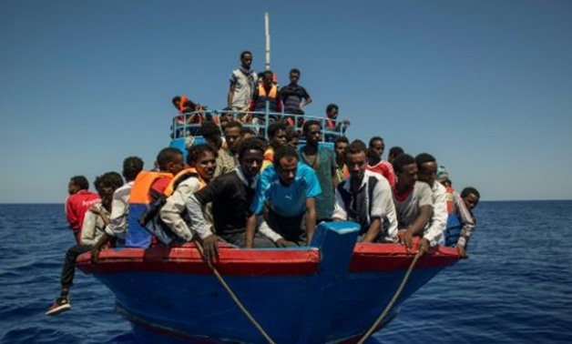 © AFP / by Cécile FEUILLATRE, Claire GALLEN | International NGOs have battled accusations that their rescue operations encourage migrants to make the dangerous Mediterranean crossing