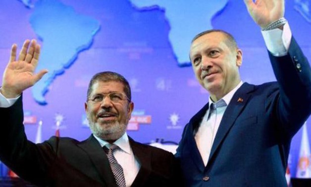 Turkish Prime Minister Erdogan is pictured here with former Egyptian President Mohammad Mursi- AFP.