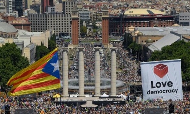  Thousands of Catalan independence supporters turned out for a June demonstration dubbed "Referendum is Democracy" in Barcelona -- but Madrid says the October 1 vote threatening Spanish unity is illegal