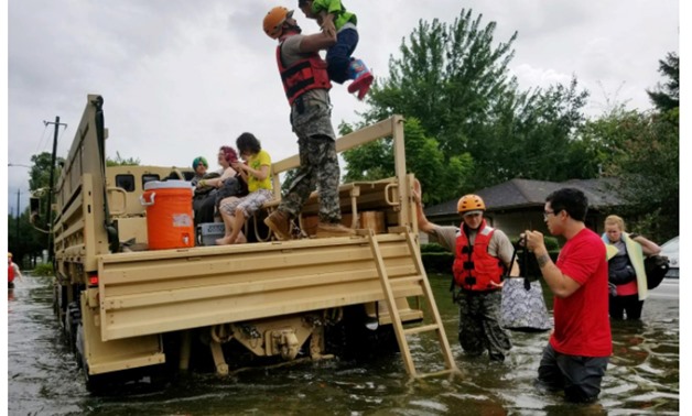 Texas National Guard soldiers aid residents in heavily flooded areas in Houston. Lt. Zachary West, 100th MPAD/Texas Military Department/via REUTERS