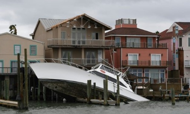 Harvey slammed into the Texas coast late Friday as a Category Four hurricane, bringing lashing rain and sustained winds of 130 miles