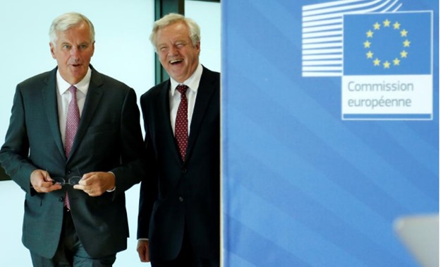 Britain's Secretary of State for Exiting the European Union David Davis (R) and European Union's chief Brexit negotiator Michel Barnier arrive for Brexit talks in Brussels,