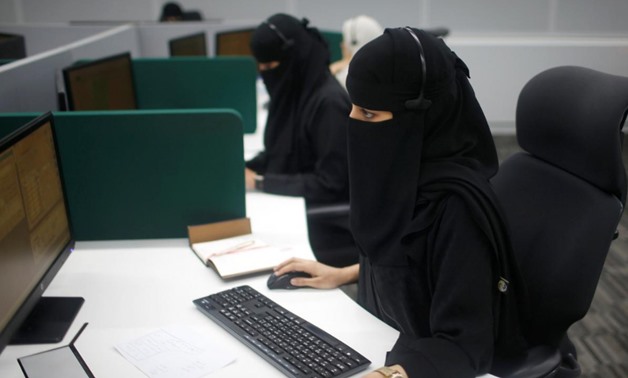 Saudi women work inside the first all-female call centre in the kingdomÕs security sector