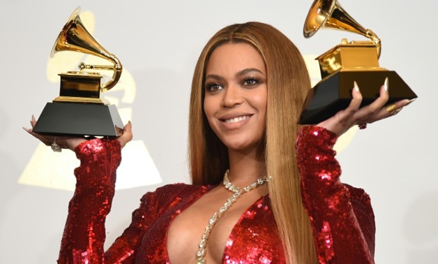 Beyonce, shown here with her Grammys earlier this year, hails from Houston and is planning generous aid in the aftermath of Hurricane Harvey