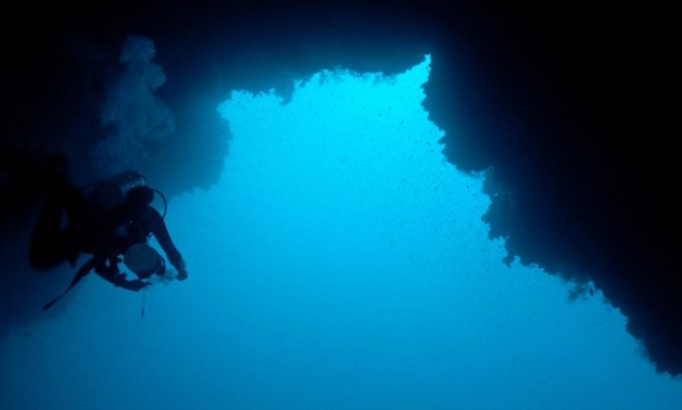 Technical diver passing under the Arch of Dahab Blue Hole in May 2009 - Tommi Salminen via Wikimedi
