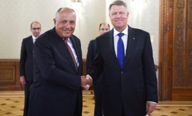 Egypt's FM Sameh Shoukry meets with the Romanian President Klaus Iohannis - File Photo