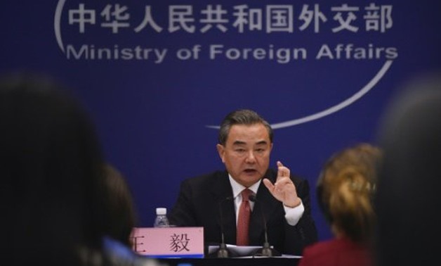 Chinese Foreign Minister Wang Yi at the briefing AFP