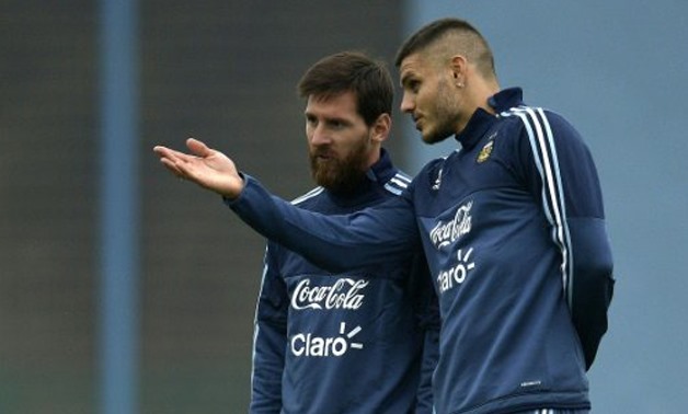 AFP | Argentina's forwards Lionel Messi (L) and Mauro Icardi talk during a training session in Ezeiza, Buenos Aires, on August 29, 2017, ahead of their FIFA World Cup qualifier match against Uruguay