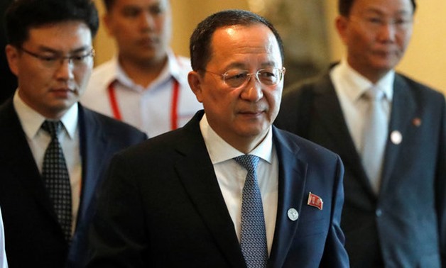 North Korean Foreign Minister Ri Yong Ho departs from his hotel to attend the 50th Association of Southeast Asian Nations (ASEAN) closing ceremony in metro Manila - REUTERS