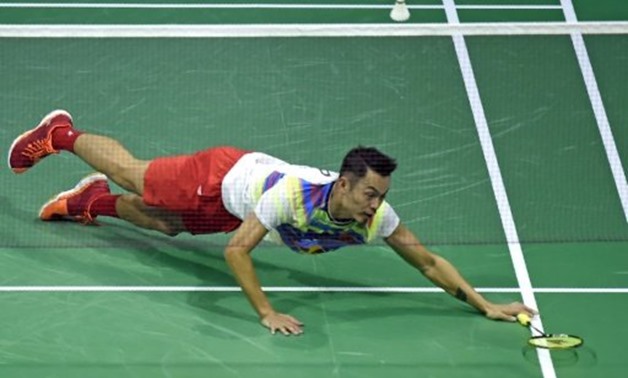 © AFP/File | China's Lin Dan returns against South Korea's Son Wan Ho during their 2017 BWF World Championships semi-final match, in Glasgow, on August 26
