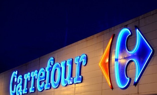© AFP | Shares in French retail giant Carrefour plunge nearly 12 percent after warning that full-year profits will fall this year.
