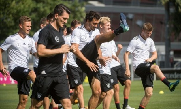 German national football team warm up during a training sessin in Stuttgart on August 30, 2017, ahead of their 2018 FIFA World Cup qualifier match against Czech Republic in Prague