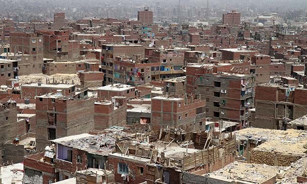 Slums where people used to live in before being displaced to Asmarat - File Photo
