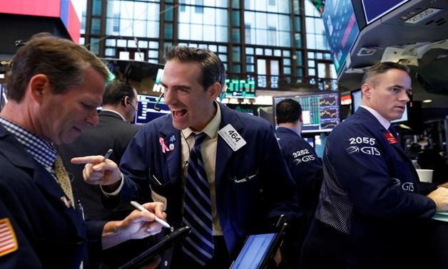 Traders work on the floor of the New York Stock Exchange (NYSE) in New York, U.S., August 31, 2017. REUTERS/Brendan McDermid