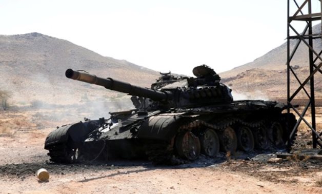 FILE PHOTO: A destroyed and burnt tank that belonged to the Libyan National Army (LNA), is seen in Gharyan south of Tripoli Libya June 27, 2019. REUTERS/Ismail Zitouny/File Photo
