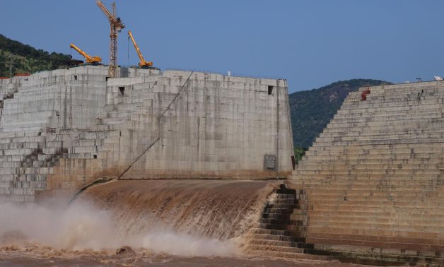 FILE - Water flows through Ethiopia's Grand Renaissance Dam as it undergoes construction work on the river Nile in Guba Woreda, Benishangul Gumuz Region, Ethiopia September 26, 2019. Reuters/Tiksa Negeri